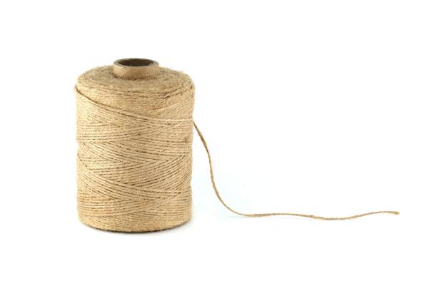 istock Natural jute twine string over white background 1635088369