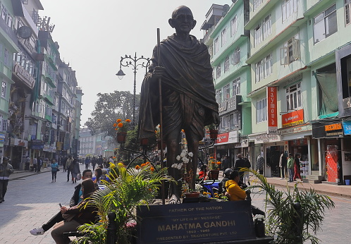 Gangtok, Sikkim, India - 14 November 2022: Mahatma Gandhi statue at MG Marg, a very popular place in Gangtok for hangout and shopping