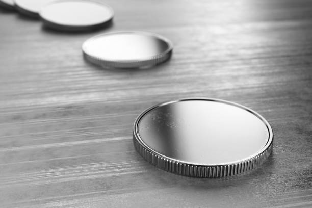 istock Silver coins without lying on a metal table. The concept of donations, savings. 3d render. 1635134746