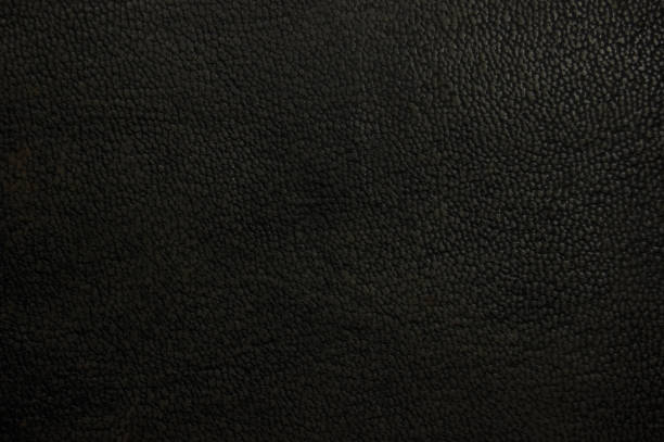istock Old aged natural grunge black full grain leather texture detail, dark grainy worn pattern background flat lay, large detailed textured grungy horizontal grained macro closeup, blank empty copy space 1635189811