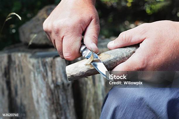 Man Carving Wooden Stick Stock Photo - Download Image Now - Penknife, Carving - Craft Activity, Wood - Material