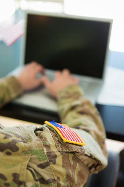 istock American Soldier typing on laptop 163520866