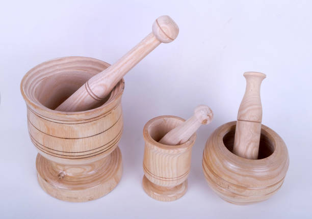 istock three wooden mortar, kitchen utensil 1635210286