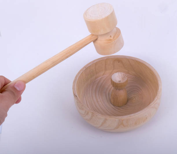 istock wooden walnut mortar, kitchen utensil 1635212426