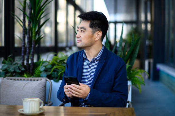 istock Asian middle-aged business man 1635218952