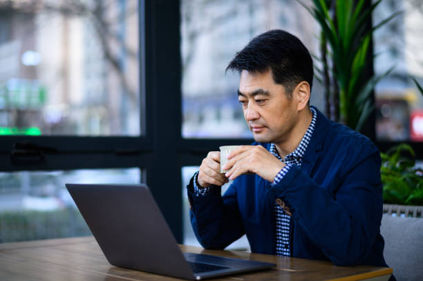 istock Asian middle-aged business man 1635220878