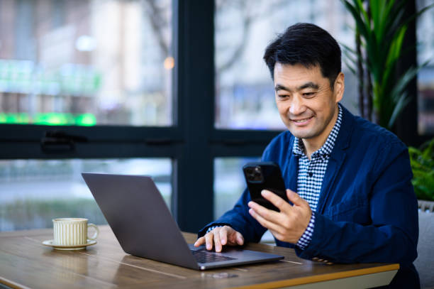 istock Asian middle-aged business man 1635221408