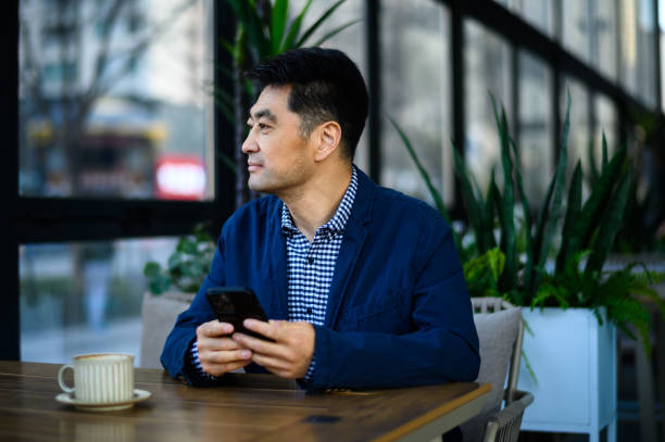 istock Asian middle-aged business man 1635223574