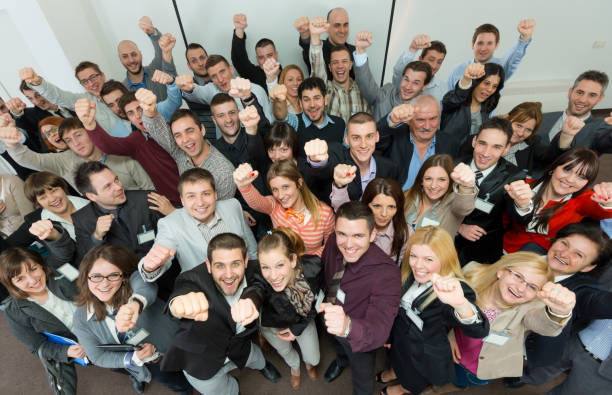 istock Business people holding their hands up. 163523566