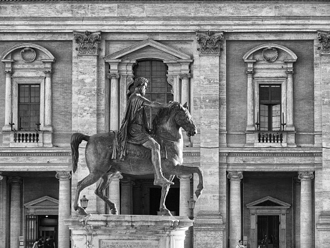 Rome, Italy, 05/14/2023: Statue of Marcus Aurelius on Campidoglio square in Rome - conservatory palace.