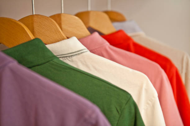 istock Coloured T-Shirts on hangers 163524126