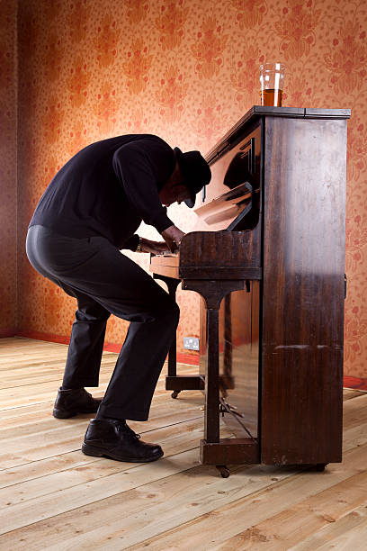 istock Mad Old Man Playing The Pub Piano 163524354