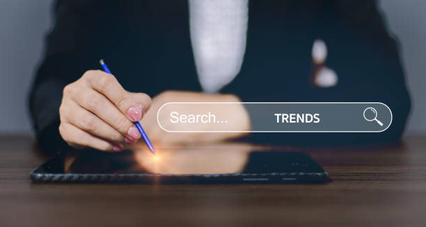 istock SEO, Search Engine Optimization concept. Young men use smartphones to find what they are interested in. Smart search, Searching information data on internet networking concept. 1635247435