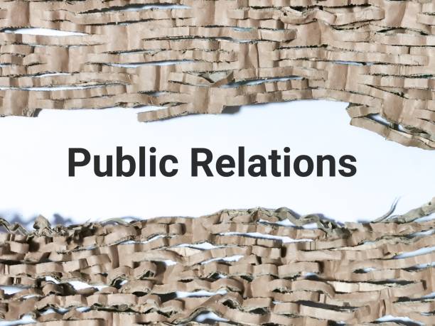 istock Public relations written between shredded brown paper. 1635260767