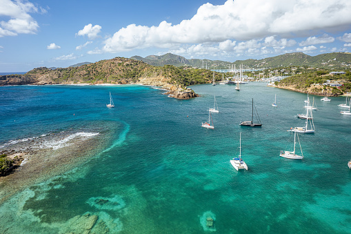 The drone aerial view of Fort Berkeley, English harbor and Nelson's dockyard national park in Antigua Island.