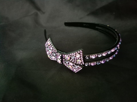 Black hair bands shinny party wear bands with  Sparkly Rhinestone Butterfly Design for kids, girls and women on a black satin background.photo taken in malaysia