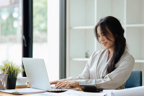 istock Professional Accountant Woman In Office Doing Accounting And Budget 1635339075