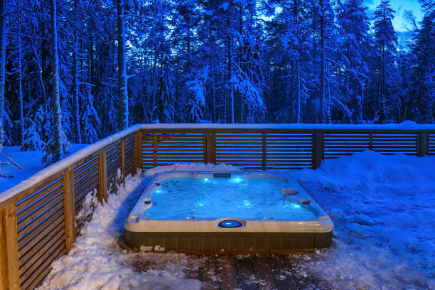 istock Hot tub on a cold winter evening 1635340171