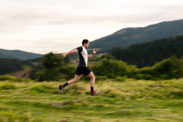 istock Young man running in the mountains 1635340304