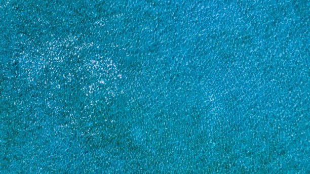 istock Tropical beach water  with crystal clear water on beach background 1635349070