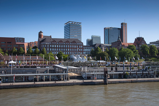 View across the Elbe River to the St Pauli Landing Stages, Port of Hamburg, Hamburg, Germany