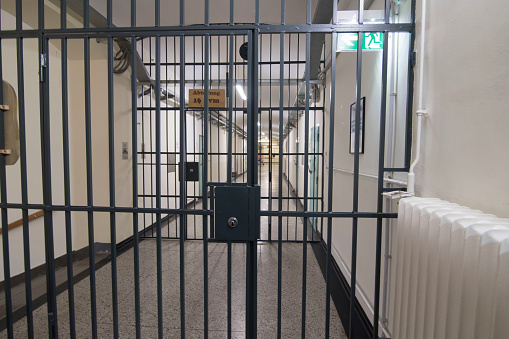 the empty corridor of a prison, no prisoners or guards