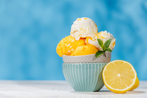 Refreshing ice cream scoops treats with a hint of zesty lemon flavour