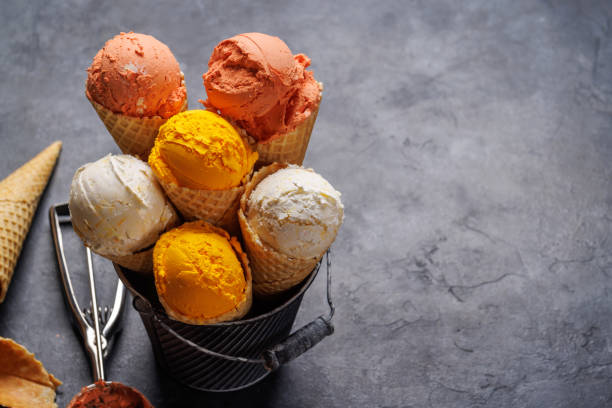 istock Assorted ice cream flavours in delightful waffle cones 1635410609
