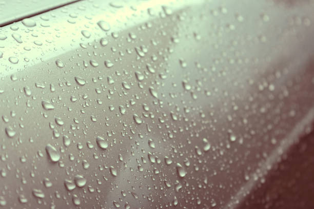 istock Water drops on metal. Rain drops on grey metal. Refreshing concept. Metallic pattern. Natural patterns. Wet metal surface. Water wallpaper. Clean car details. 1635418793