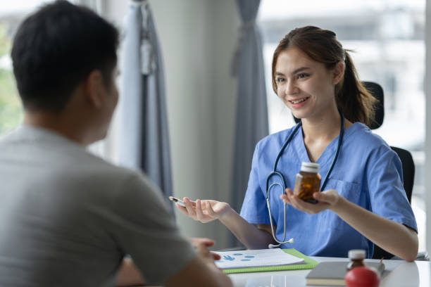 istock Confident female doctor with medical stethoscope introducing and explaining treatment guidelines, medication, care, therapy to patients. concept of treatment, service, consultation, health insurance 1635466959