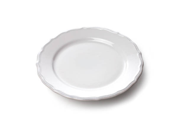 istock Isolated ceramic plate flower shape top view on white background 1635477216