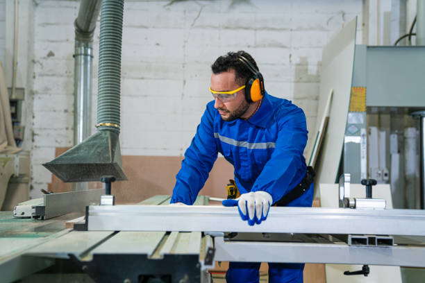 istock Modern industrial machine operator working in industrial factory. 1635515241