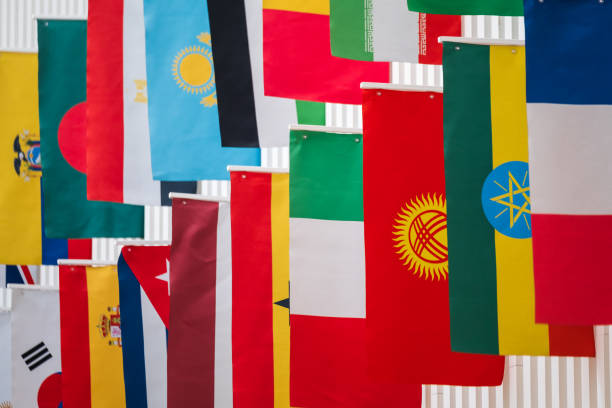 istock Flag of different countries hanging on wall 1635532356