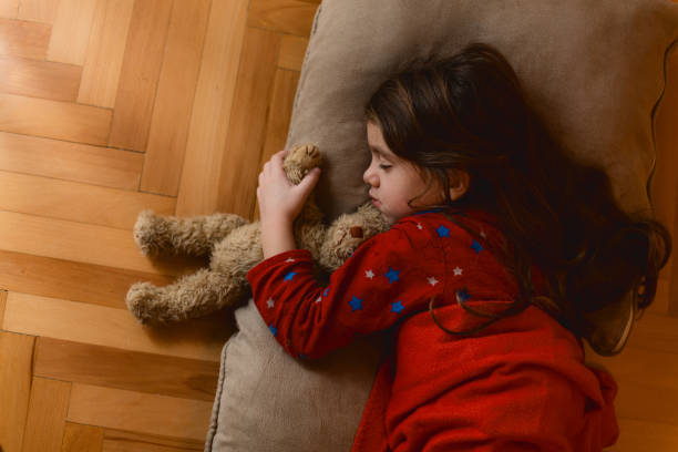 istock Little girl sleeping on a pillow 1635537737