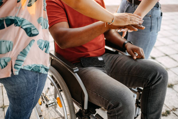 istock Different colour hands of young adults 1635550156