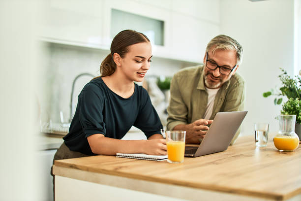 istock Watching a funny video in the morning. 1635551274