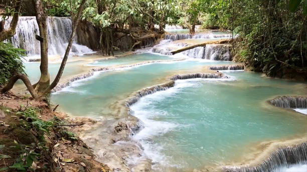 istock Light steps in Kuangsi Waterfall Park in Luang Prabang, Laos. 1635553722