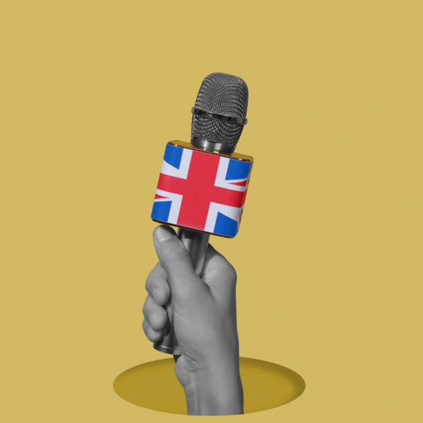 istock man with a mic patterned with the flag of UK 1635566014