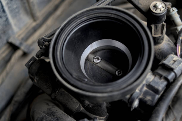istock The installed throttle body on the engine. 1635578348