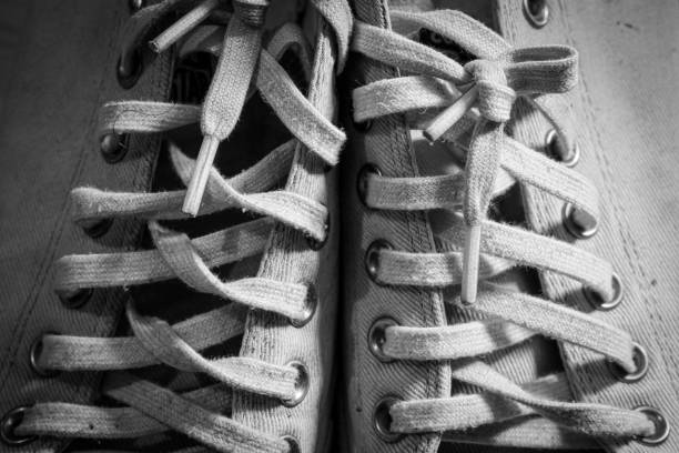 istock Tie the laces on the shoes. 1635595504