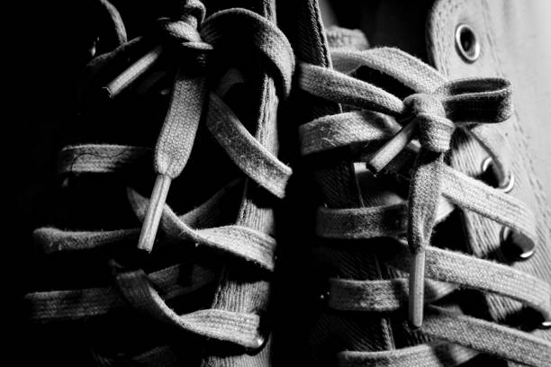 istock Tie the laces on the shoes. 1635596047
