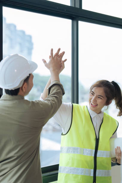 istock engineer teamwork and architect working and high five for successful job at construction site 1635603649
