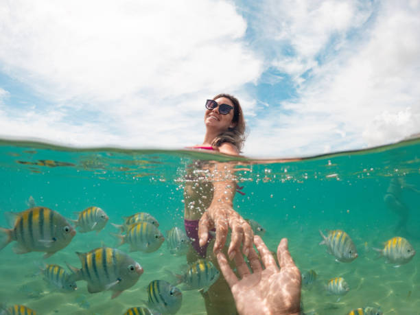 istock Woman on Brazilian tropical beach 1635614313