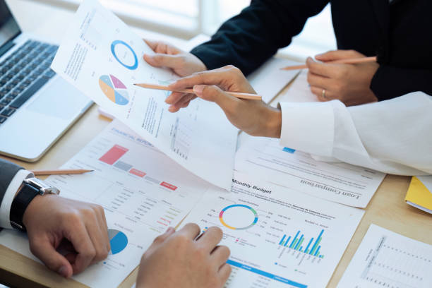 istock analyst team is doing teamwork and brainstorming about new strategy project at the meeting room. 1635631670