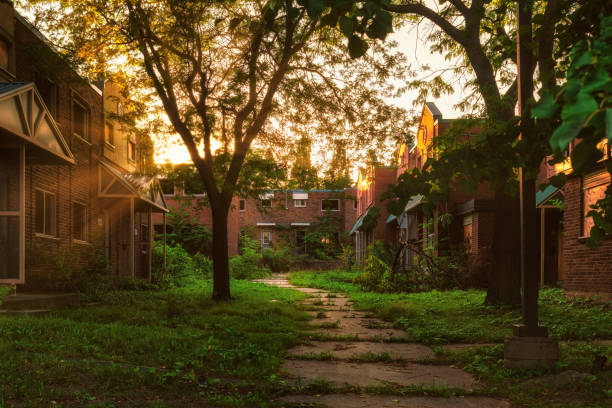 istock Sunset over a Set of Abandon Apartments Complexes 1635662867