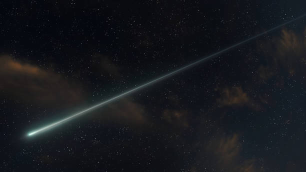 istock Meteor lights up sky. Shooting star, glowing fireball. 1635713916