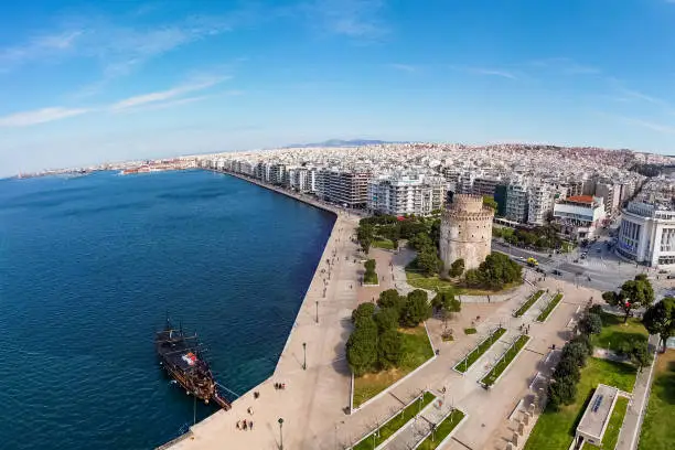 View of the White Tower and a coastline in Thessaloniki, Greece. Taken with drone.