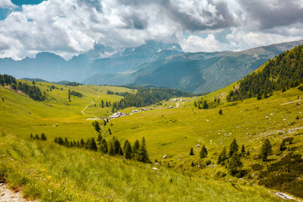 istock landscape with mountains, hills, clouds and trees 1635738115