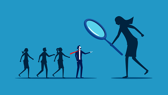Stand out and be different. business people recruiting human resources with a magnifying glass. vector