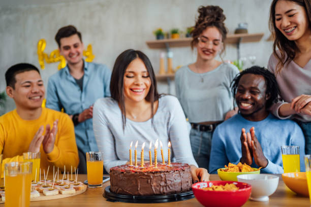 istock Young woman celebrating a birthday 1635752304